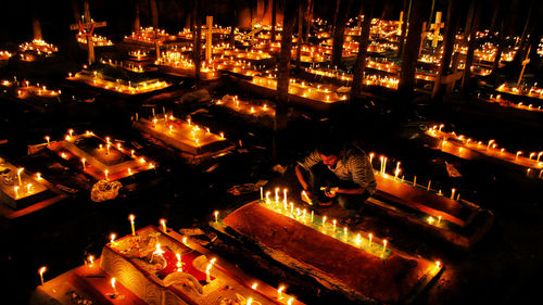 High angle view of illuminated candles