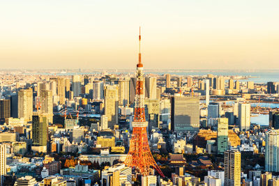 High angle view of city buildings during sunset