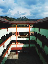 View of building against cloudy sky