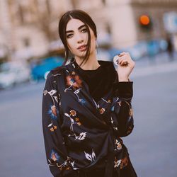 Young woman standing on street