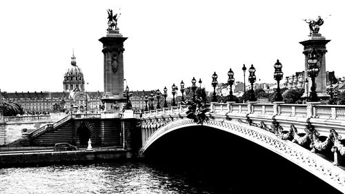 View of bridge against cloudy sky