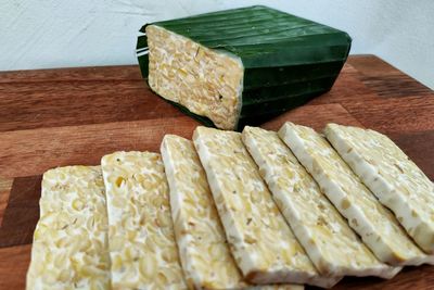 High angle view of bread on cutting board