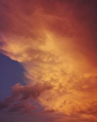 Low angle view of dramatic sky during sunset