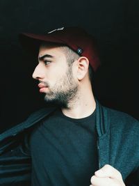 Portrait of young man looking away