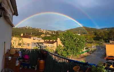 Rainbow over city