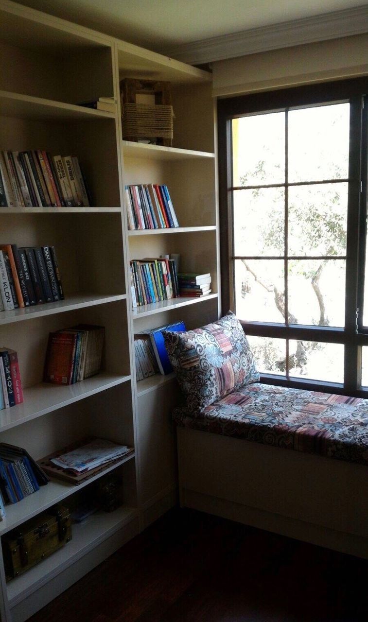 bookshelf, shelf, book, indoors, home interior, window, no people, day, library, domestic room