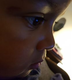 Close-up portrait of woman looking away