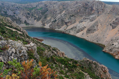 High angle view of sea and mountains