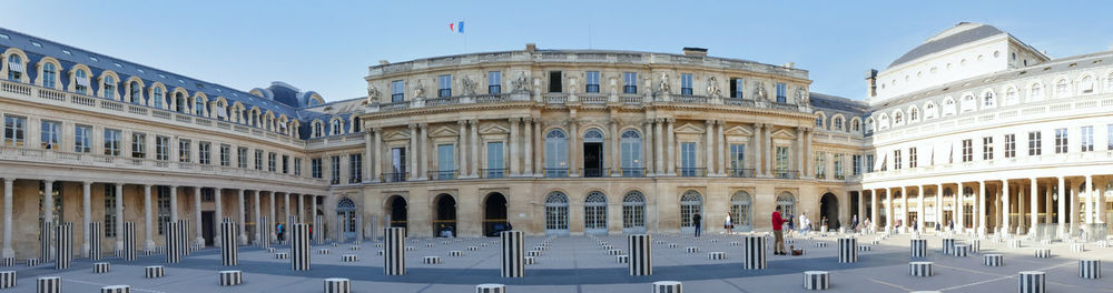 Facade of historic building against sky