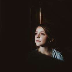 Beautiful woman in darkroom