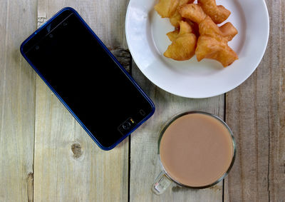 High angle view of breakfast served on table