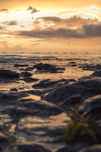 Scenic view of sea against sky during sunset