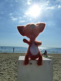 Man on beach against sky