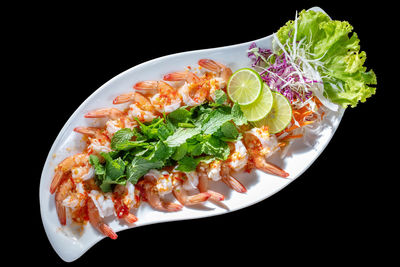 High angle view of salad in plate on table