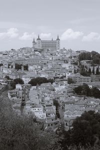 Buildings in city against sky