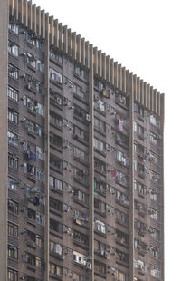 Low angle view of apartment building against sky