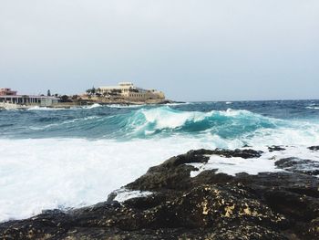 Scenic view of sea against clear sky