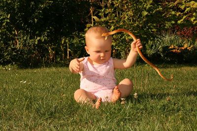 Girl playing in field