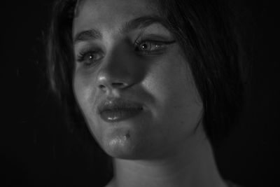 Close-up portrait of young woman