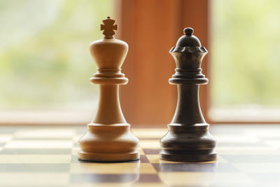 Close-up of chess pieces on board