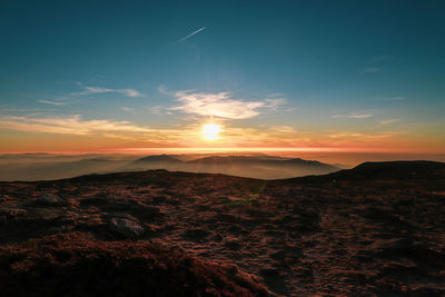 Scenic view of silhouette landscape against sky during sunset