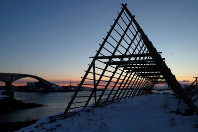 View of bridge against sky at sunset