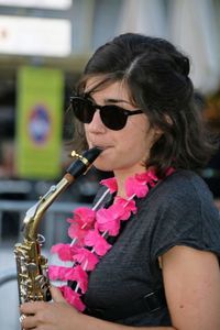 Portrait of woman playing saxophon