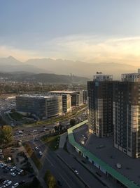 High angle view of buildings against sky during sunset