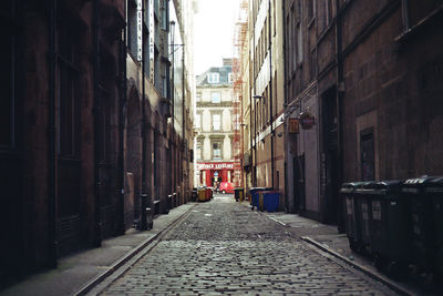 Narrow alley along buildings