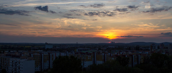 High angle view of townscape against sky during sunset