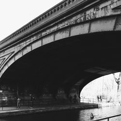 Low angle view of bridge over river