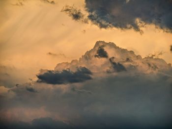 Low angle view of clouds in sky during sunset