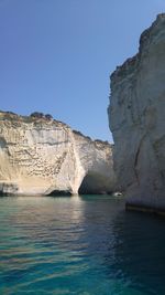 Scenic view of sea against clear blue sky