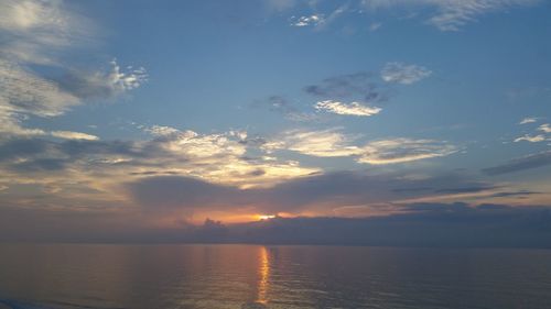 Scenic shot of calm sea at sunset