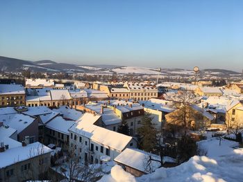 High angle view of houses in town during winter