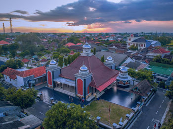 High angle view of buildings in city against sky