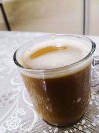 Close-up of coffee cup on table