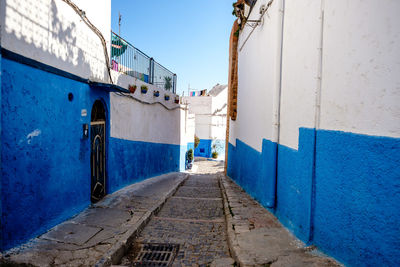 View of buildings against blue sky