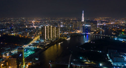 Illuminated buildings in city at night