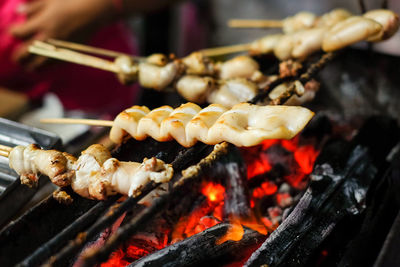 Close-up of meat on barbecue grill