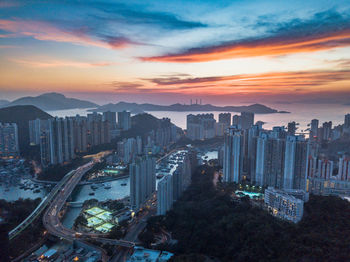 Cityscape against sky during sunset