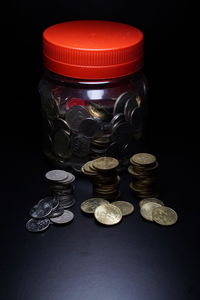 Close-up of coins on table