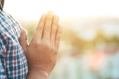 Cropped hand of woman holding hands