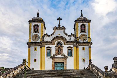 Facade of old historic church in baroque style in ouro preto city, minas gerais, brazil