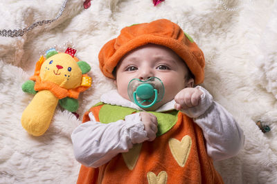 Cute baby girl with toy