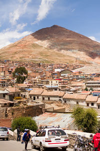 Buildings in city against sky