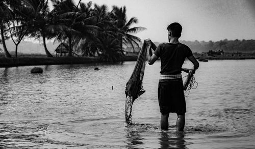 Full length of man walking on beach