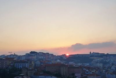 High angle view of townscape against sky during sunset
