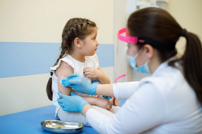 The child is afraid of being vaccinated. trusting relationship between doctor and patient. 