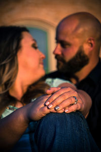 Close-up of man holding hands